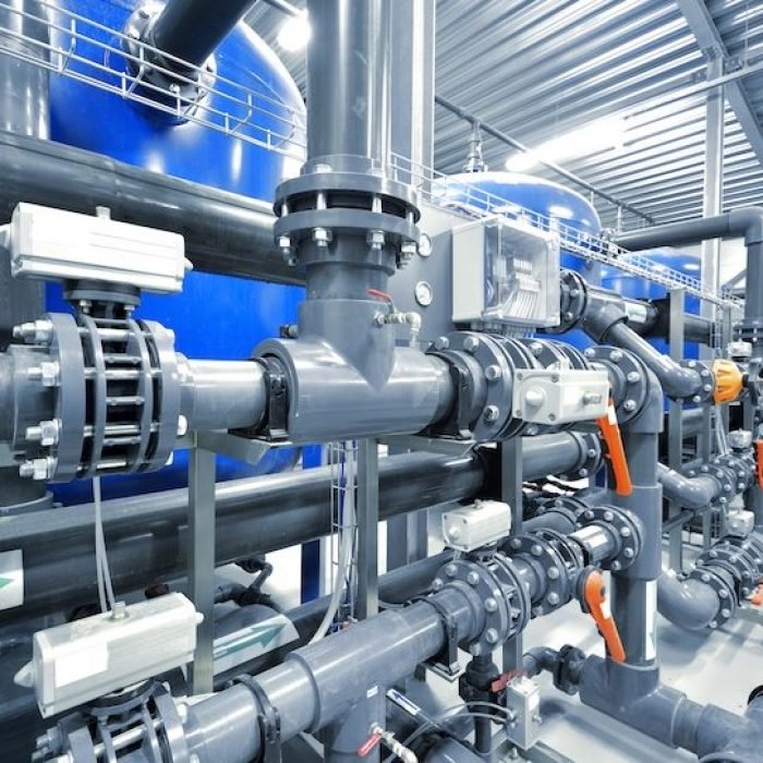 new plastic pipes and colorful equipment in industrial boiler room